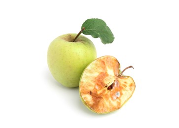 Photo of Spoiled and good apples isolated on white