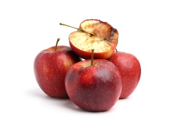 Photo of Spoiled apple and good ones isolated on white
