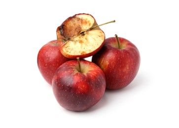 Photo of Spoiled apple and good ones isolated on white