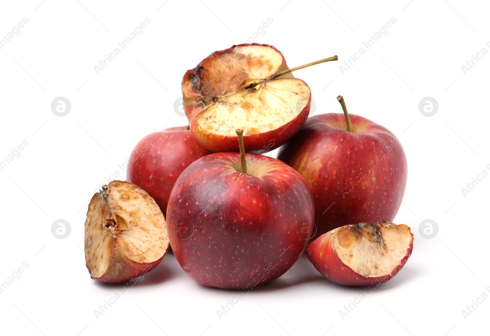 Spoiled apple and good ones isolated on white Photo of Spoiled apple and good ones isolated on white