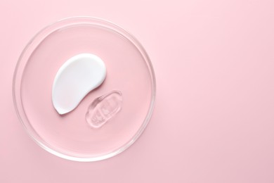 Photo of Different cosmetic products in Petri dish on pink background, top view. Space for text