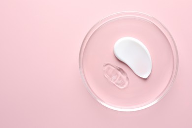 Photo of Different cosmetic products in Petri dish on pink background, top view. Space for text