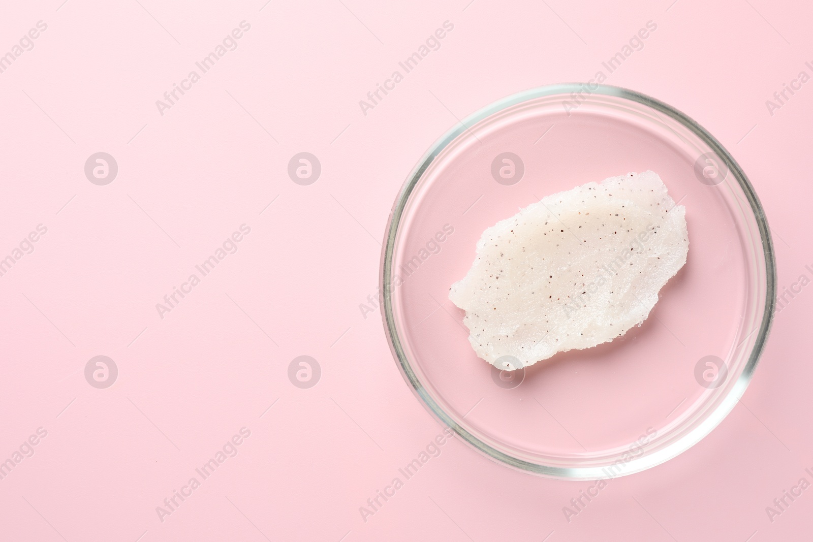 Cosmetic product in Petri dish on pink background, top view. Space for text Photo of Cosmetic product in Petri dish on pink background, top view. Space for text