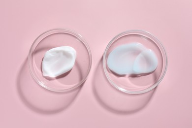 Photo of Different cosmetic products in Petri dishes on pink background, flat lay