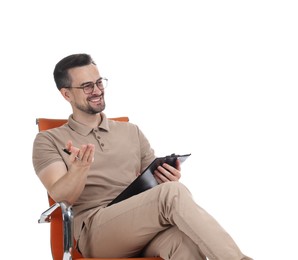 Photo of Professional psychologist with clipboard in armchair on white background