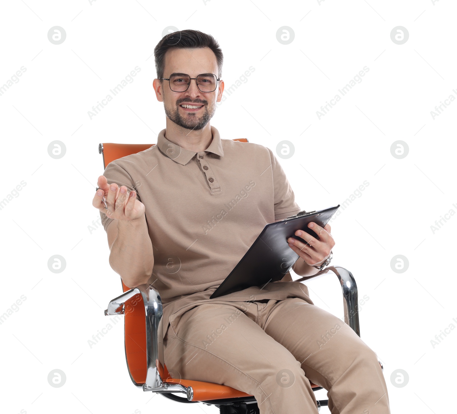 Professional psychologist with clipboard in armchair on white background Photo of Professional psychologist with clipboard in armchair on white background