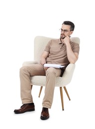 Photo of Professional psychologist with clipboard in armchair on white background