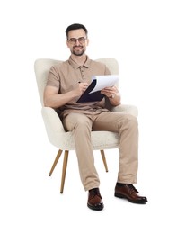 Photo of Professional psychologist with clipboard in armchair on white background
