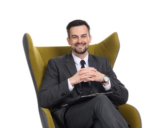Photo of Professional psychologist with clipboard in armchair on white background