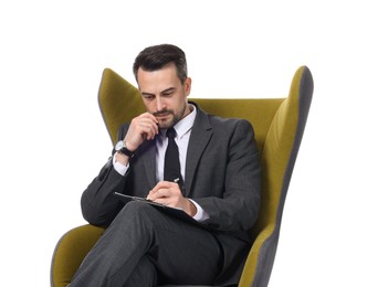 Photo of Professional psychologist with clipboard in armchair on white background