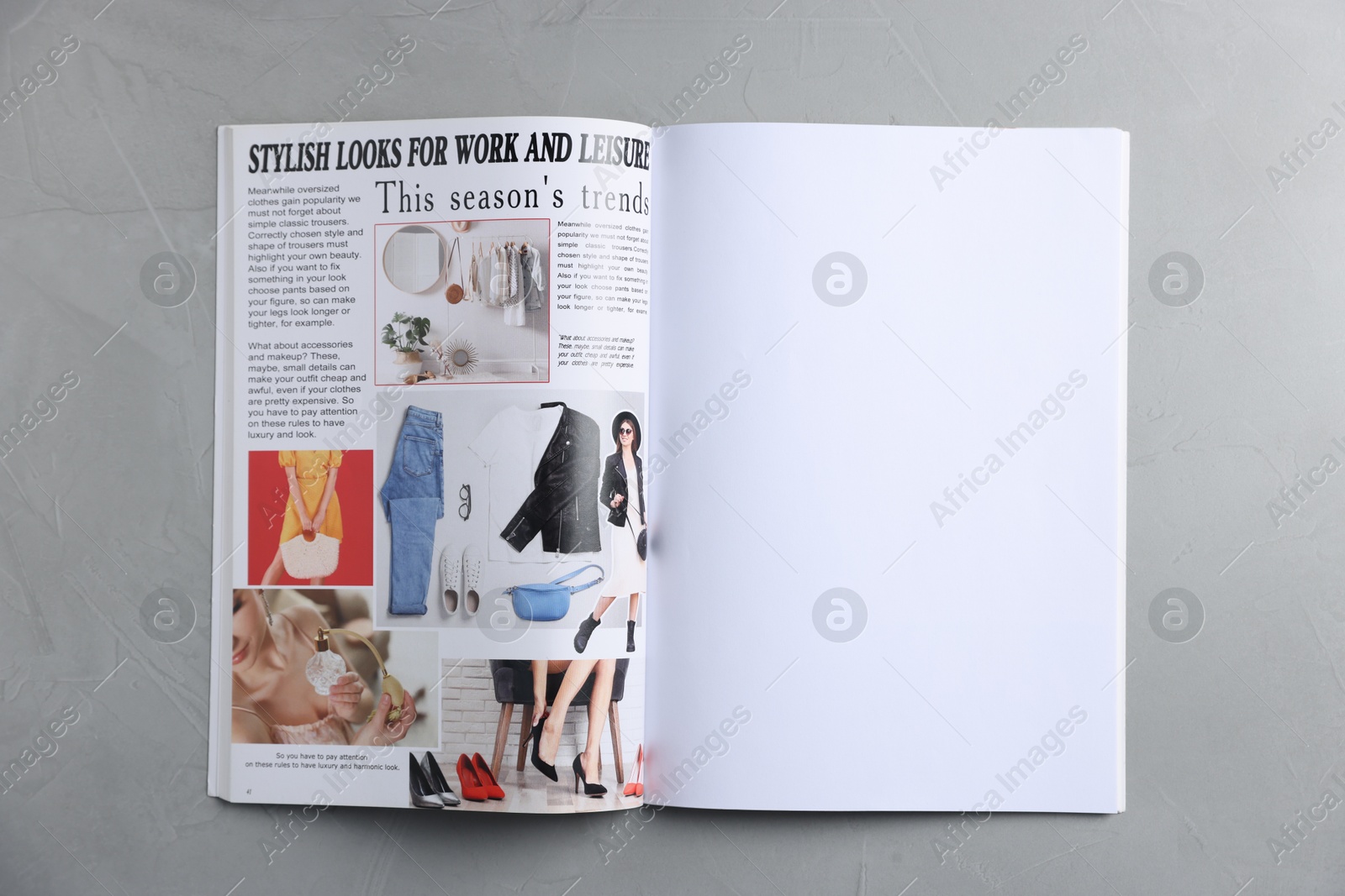 Open magazine on light grey table, top view. Mockup for design Photo of Open magazine on light grey table, top view. Mockup for design