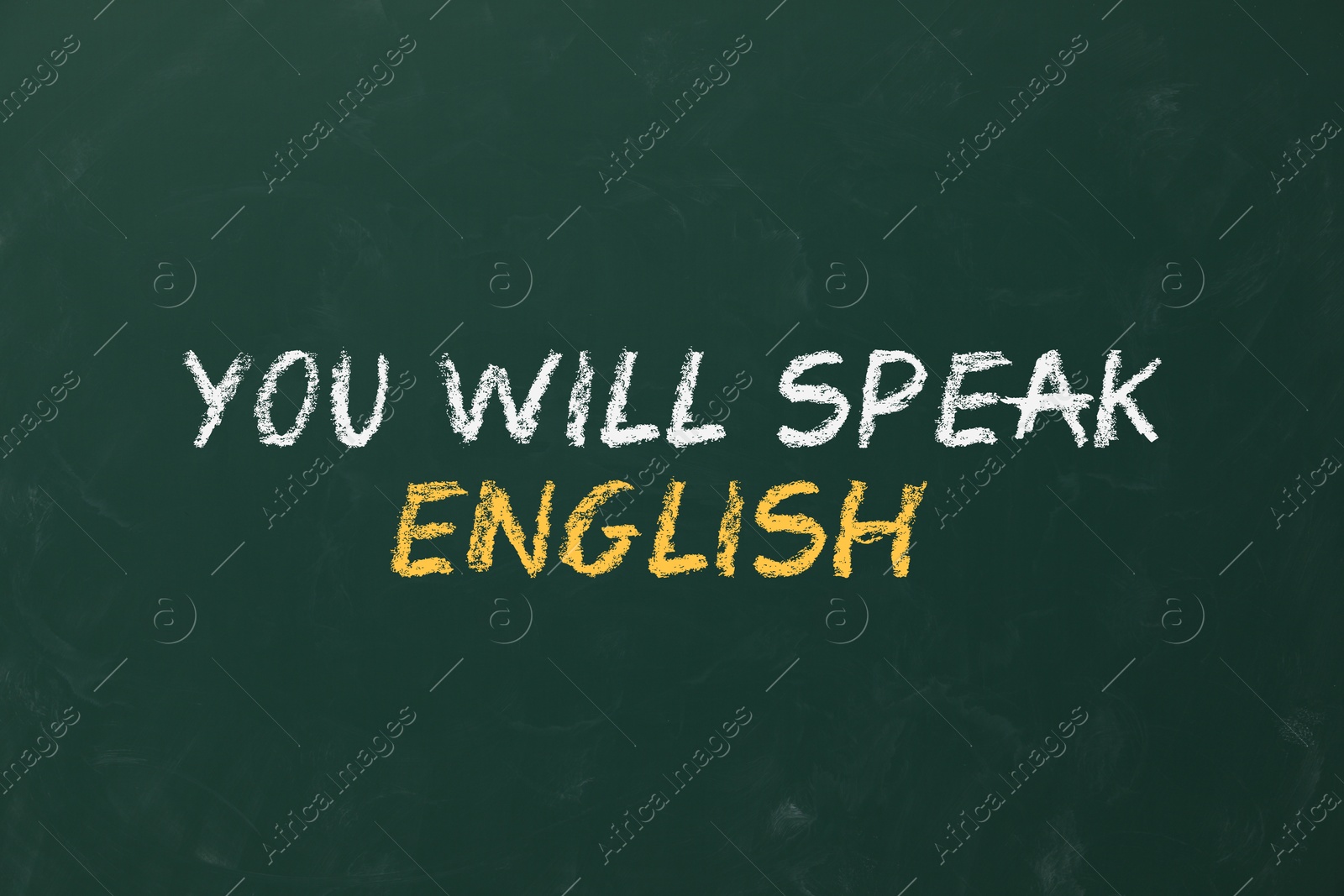 You Will Speak English inscription on green chalkboard. Language course Image of You Will Speak English inscription on green chalkboard. Language course