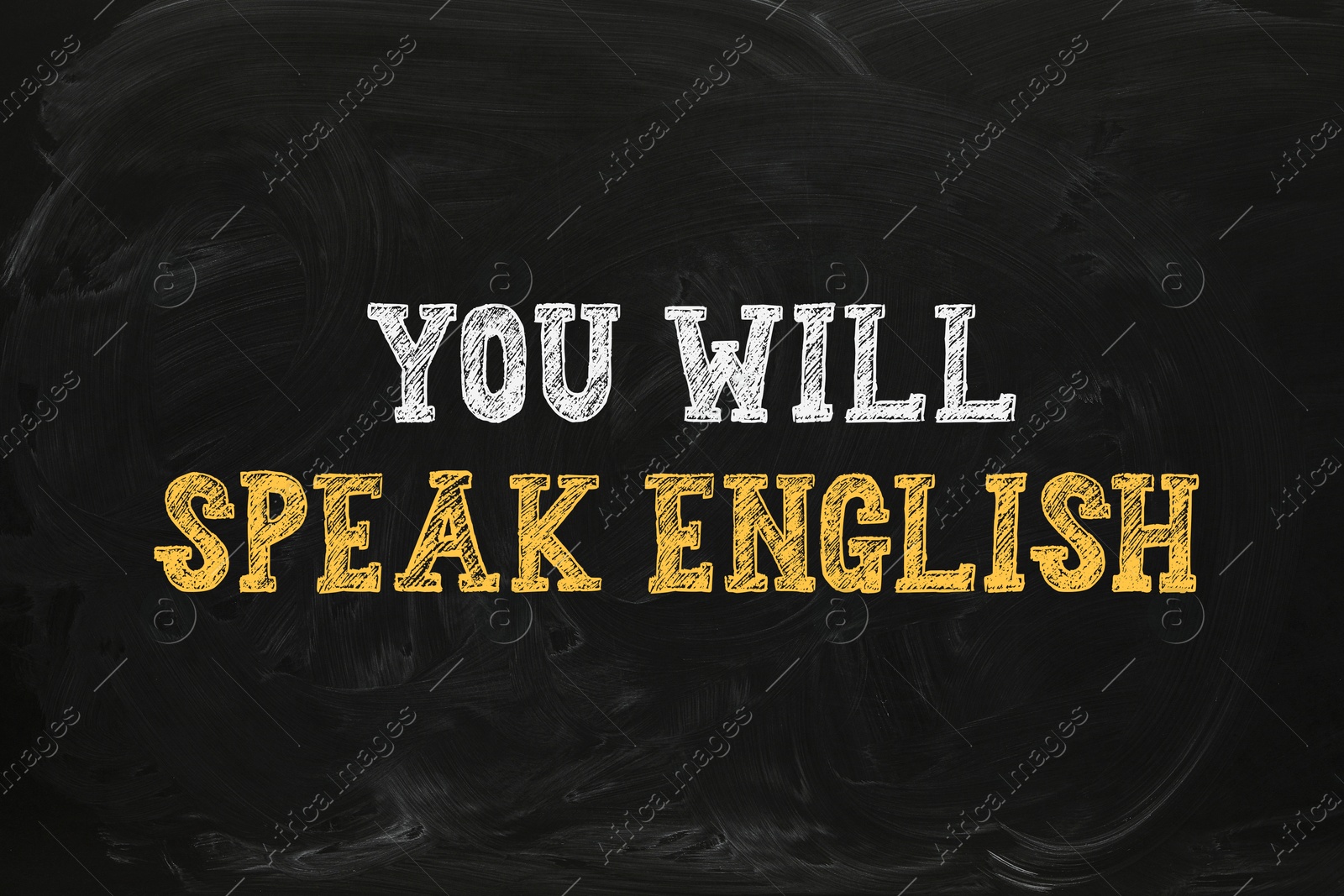 You Will Speak English inscription on black chalkboard. Language course Image of You Will Speak English inscription on black chalkboard. Language course