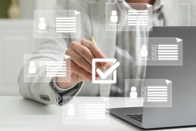 Image of Human resources manager putting check mark on virtual screen with resumes, closeup