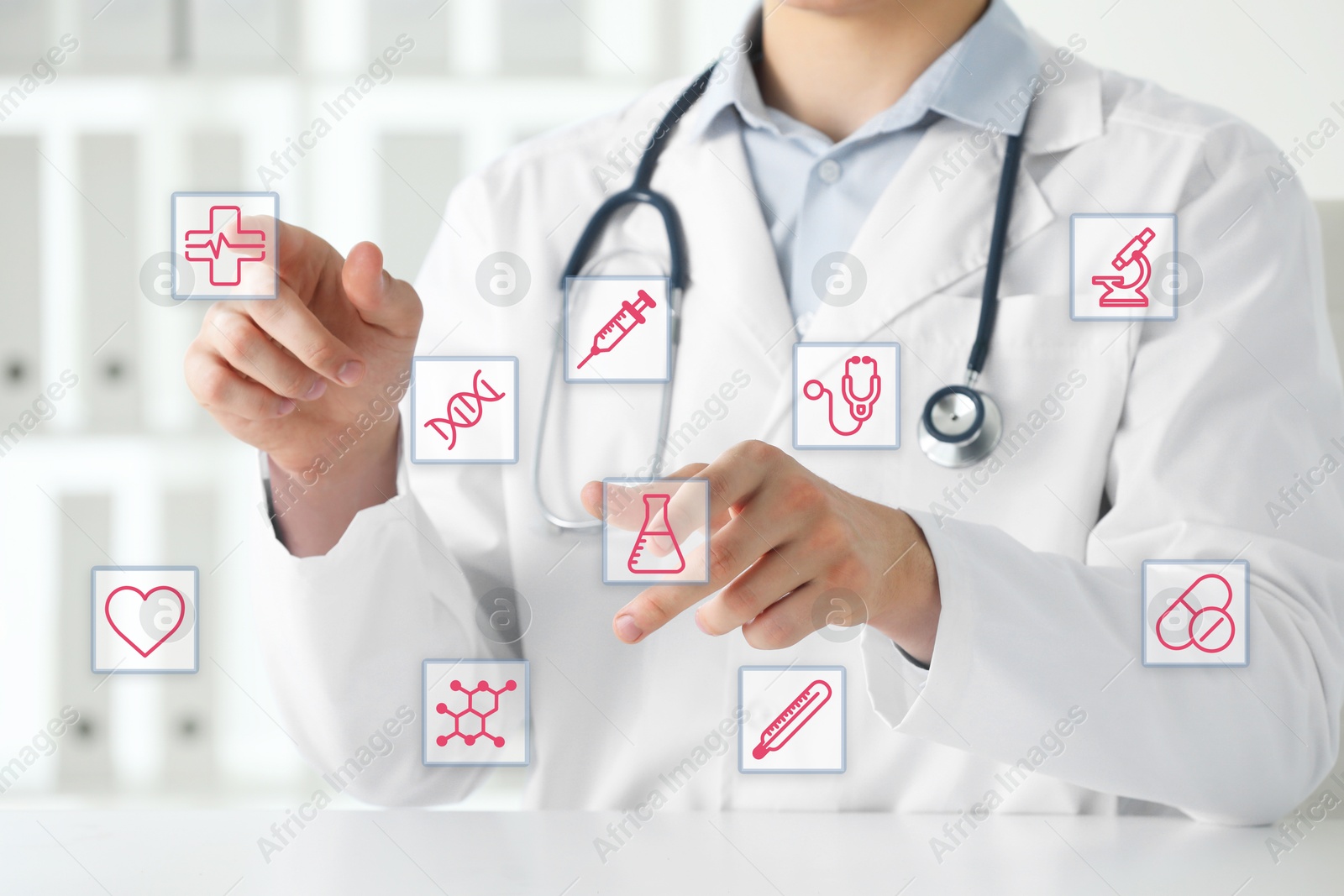 Doctor using virtual screen with healthcare icons in office, closeup Image of Doctor using virtual screen with healthcare icons in office, closeup