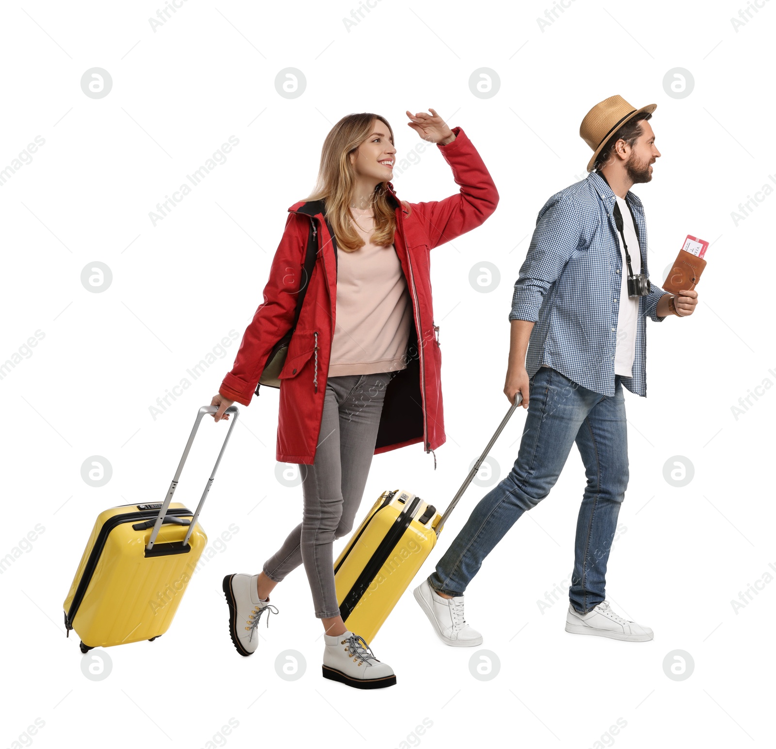 Couple with suitcases walking on white background Image of Couple with suitcases walking on white background