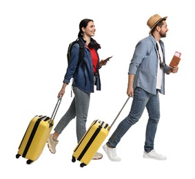 Image of Couple with suitcases walking on white background