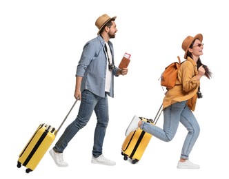 Image of Man and woman with suitcases on white background