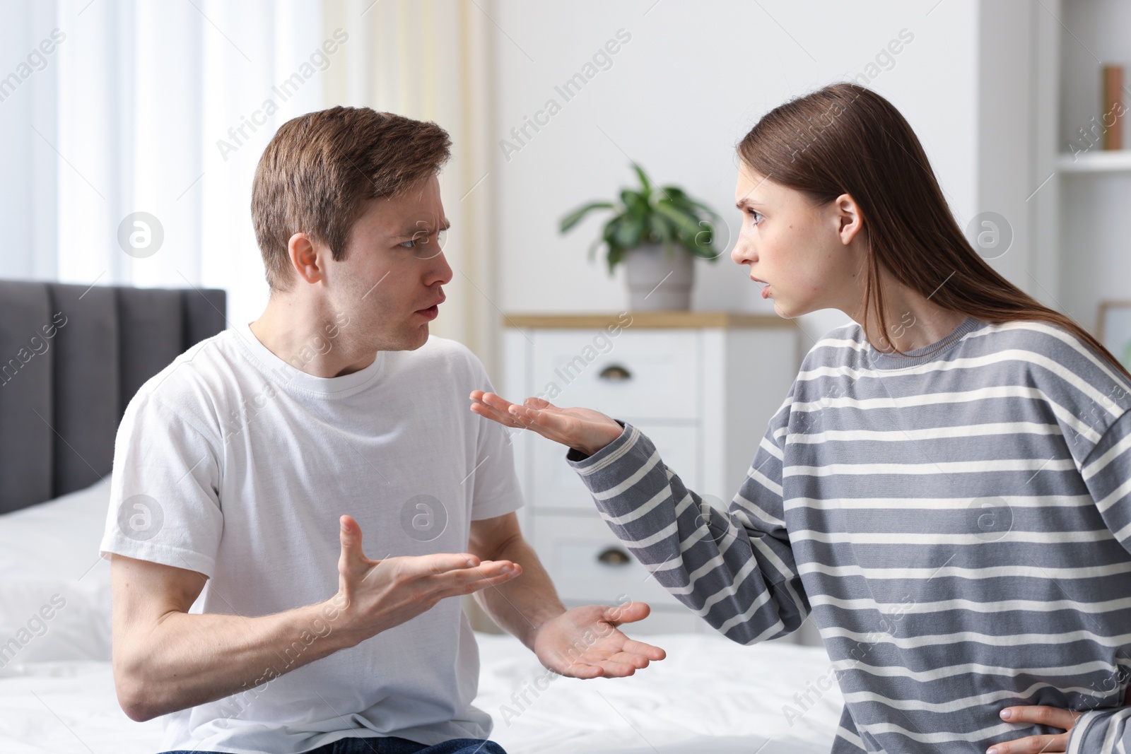 Photo of Woman and man having fight at home