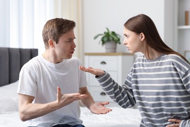 Photo of Woman and man having fight at home