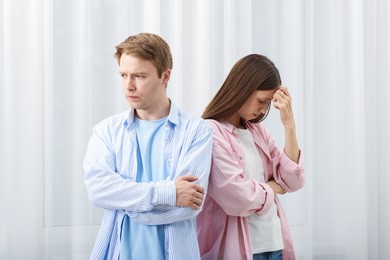 Photo of Woman and man having quarrel at home