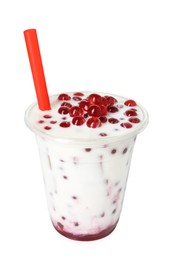 Photo of Tasty milk bubble tea in plastic cup isolated on white