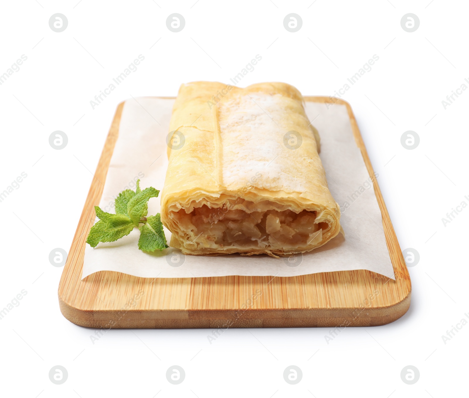 Tasty apple strudel with powdered sugar and mint isolated on white Photo of Tasty apple strudel with powdered sugar and mint isolated on white