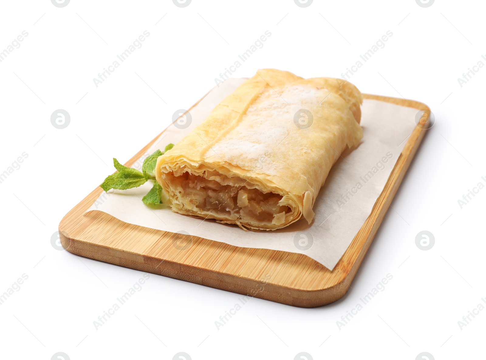 Tasty apple strudel with powdered sugar and mint isolated on white Photo of Tasty apple strudel with powdered sugar and mint isolated on white