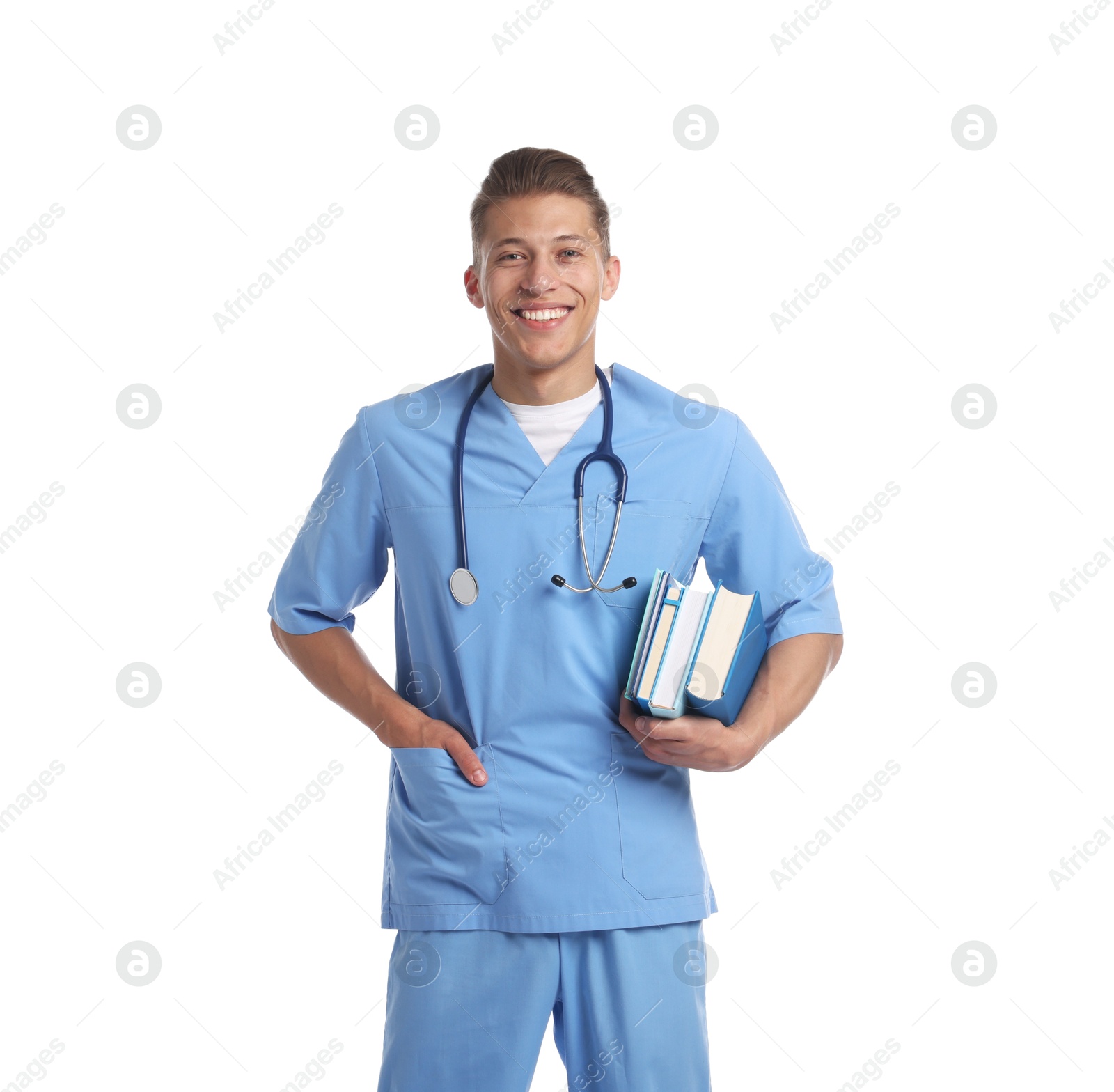 Medical student with books on white background Photo of Medical student with books on white background