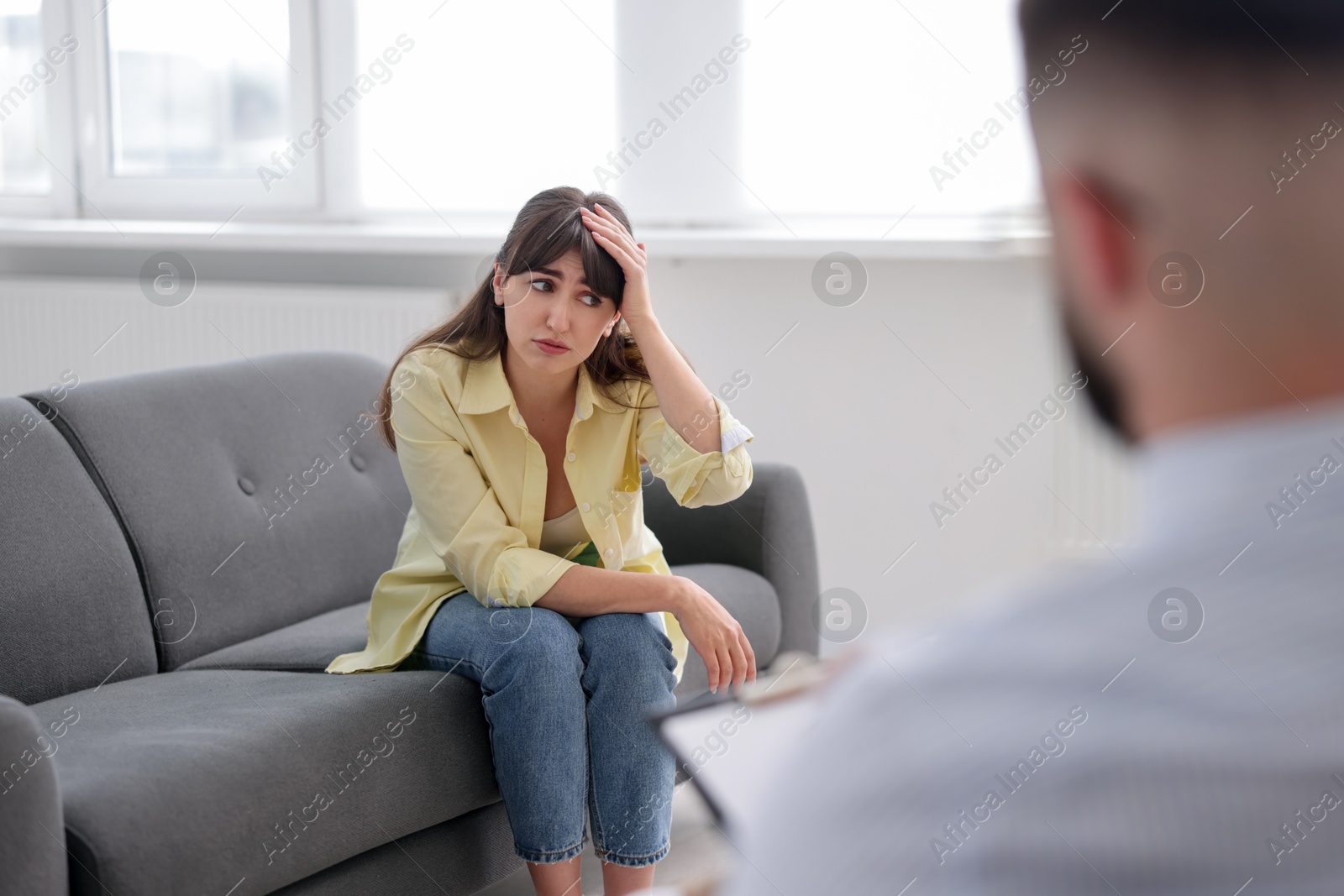 Professional psychologist working with patient in office, selective focus Photo of Professional psychologist working with patient in office, selective focus