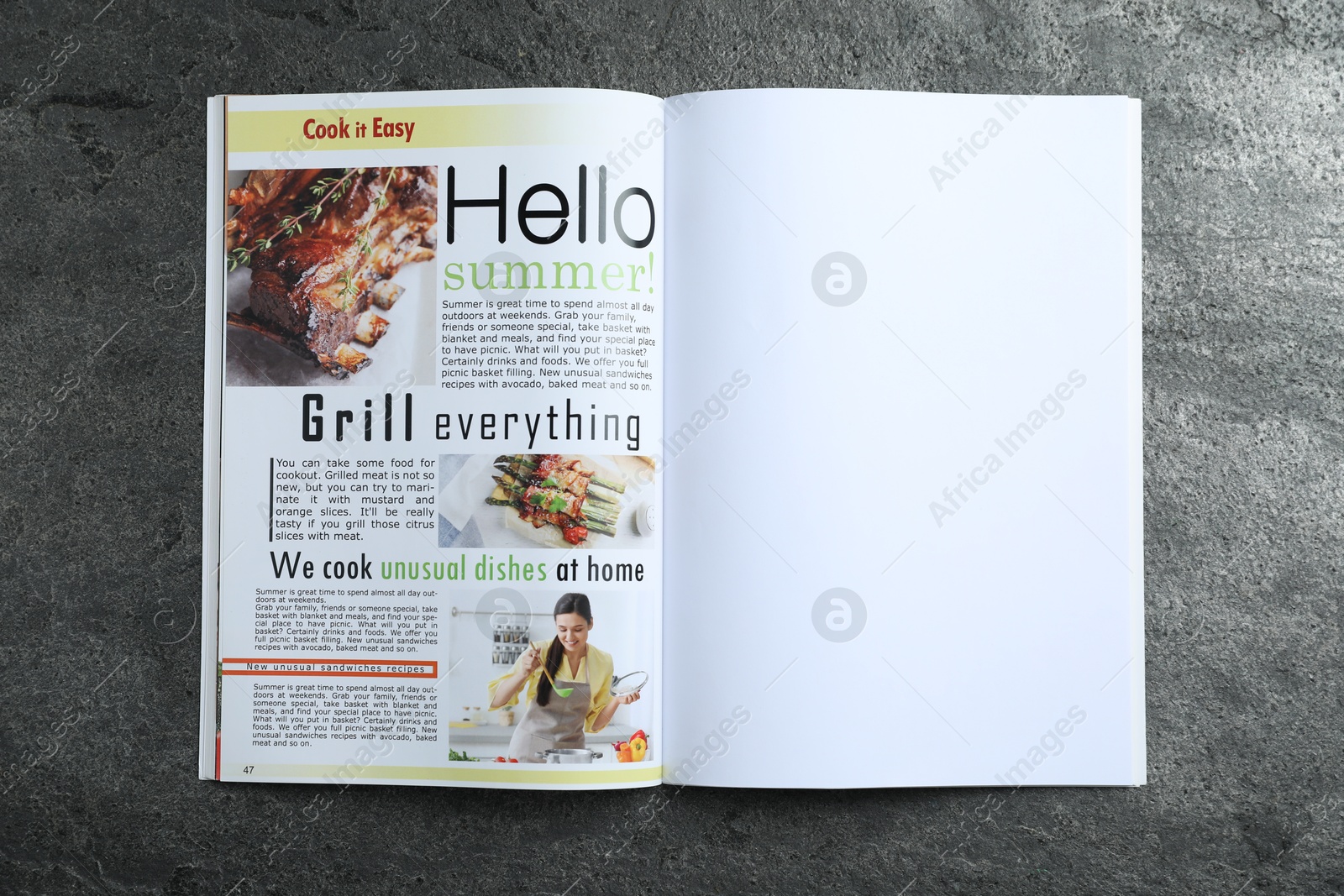 Open magazine on grey table, top view. Mockup for design Photo of Open magazine on grey table, top view. Mockup for design