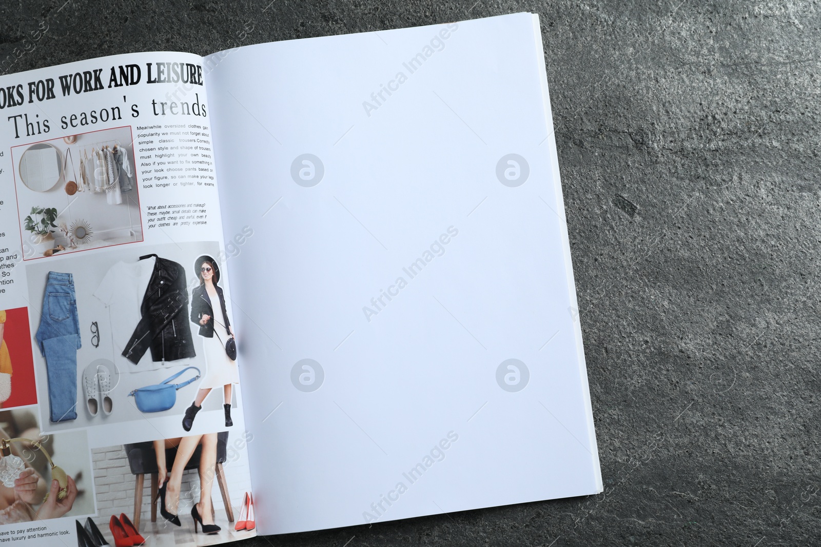Open magazine on grey table, top view. Mockup for design Photo of Open magazine on grey table, top view. Mockup for design