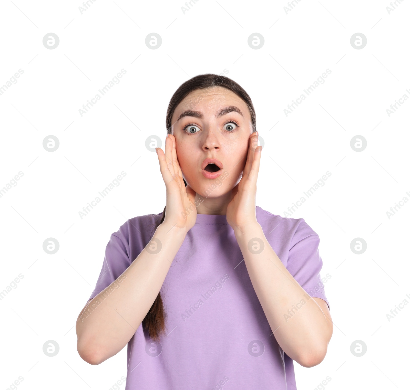 Portrait of surprised woman on white background Photo of Portrait of surprised woman on white background