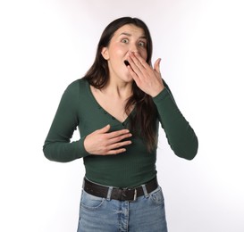 Photo of Portrait of surprised woman on white background