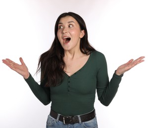 Photo of Portrait of surprised woman on white background
