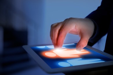 Image of Dismissal. Businessman choosing human figure on tablet computer indoors, closeup