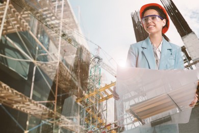 Image of Engineer with draft and unfinished buildings, multiple exposure