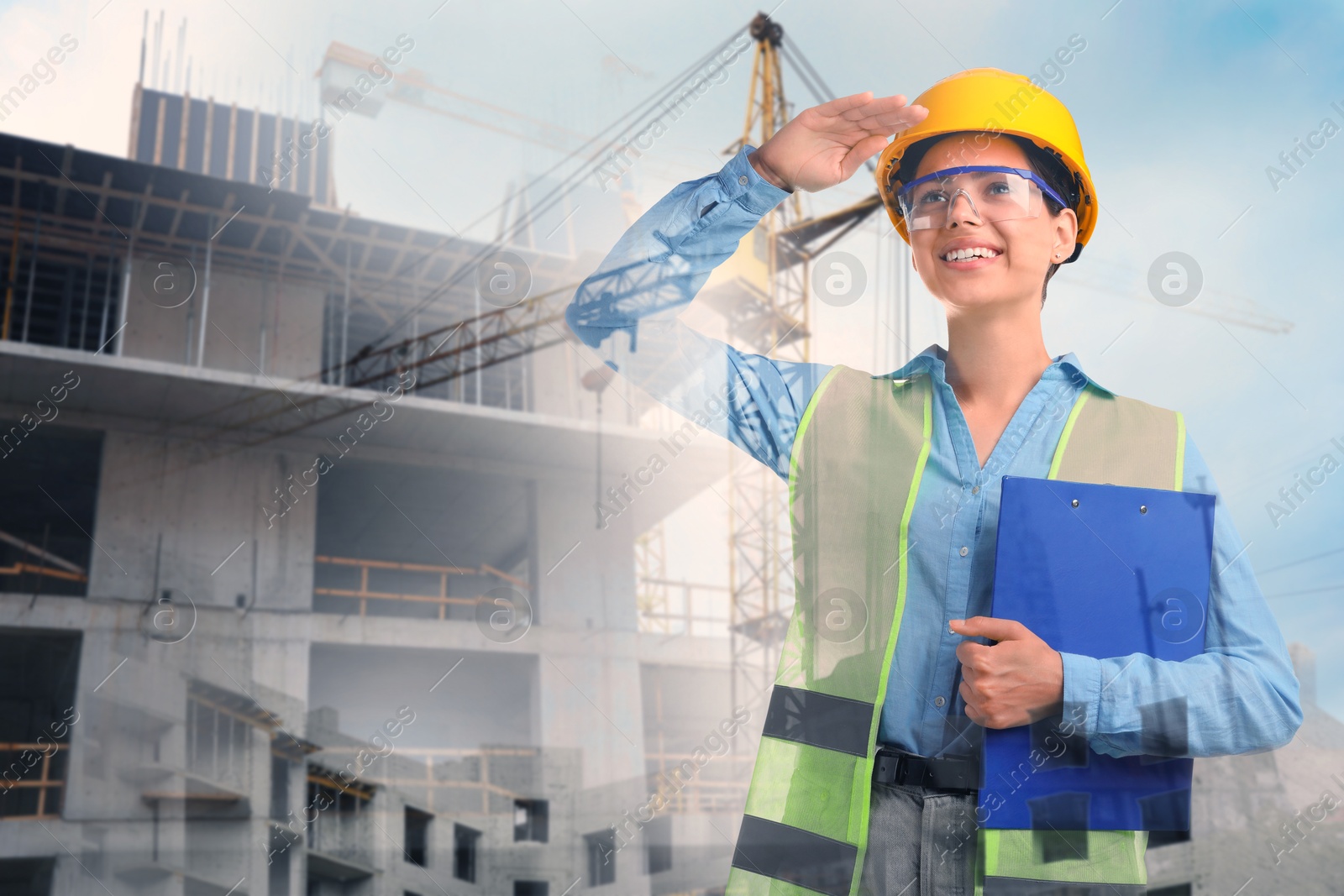 Engineer with clipboard and unfinished buildings, multiple exposure Image of Engineer with clipboard and unfinished buildings, multiple exposure