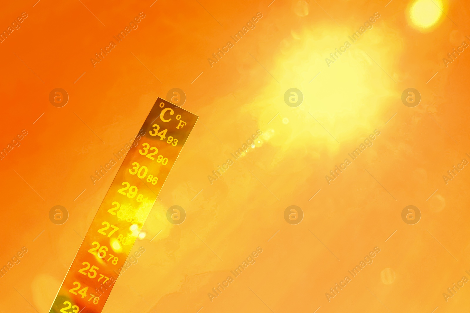 Orange sky during hot summer weather. thermometer showing high temperature Image of Orange sky during hot summer weather. thermometer showing high temperature