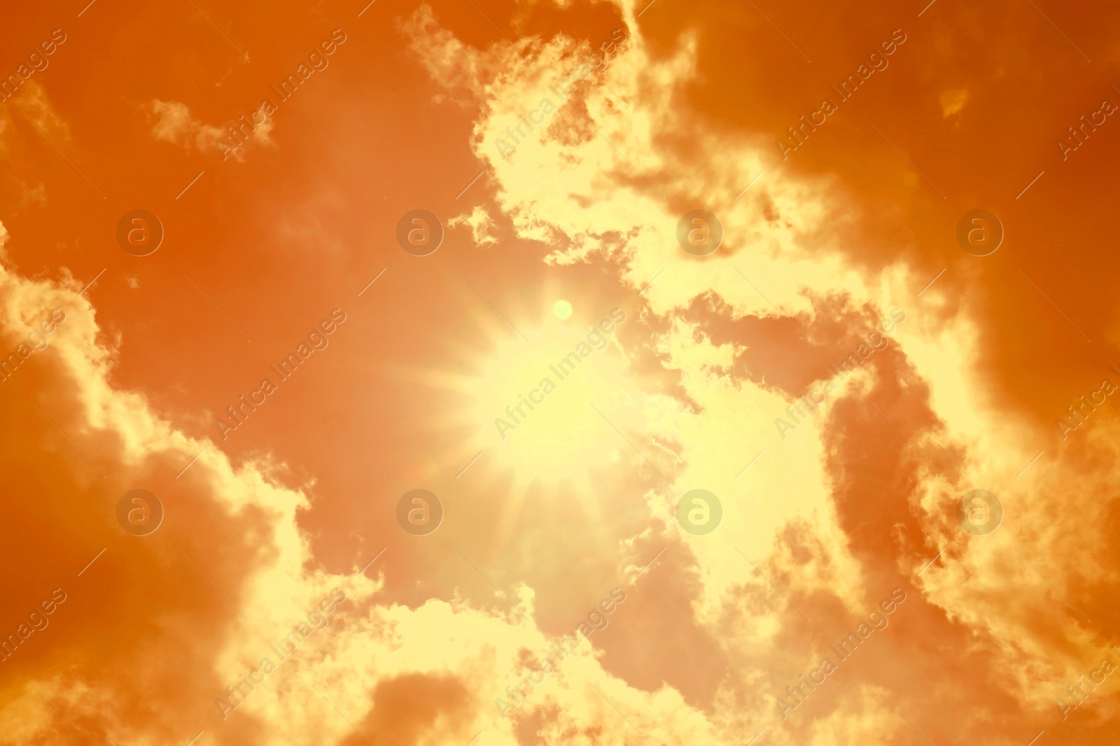 Orange sky with clouds during hot summer weather Image of Orange sky with clouds during hot summer weather