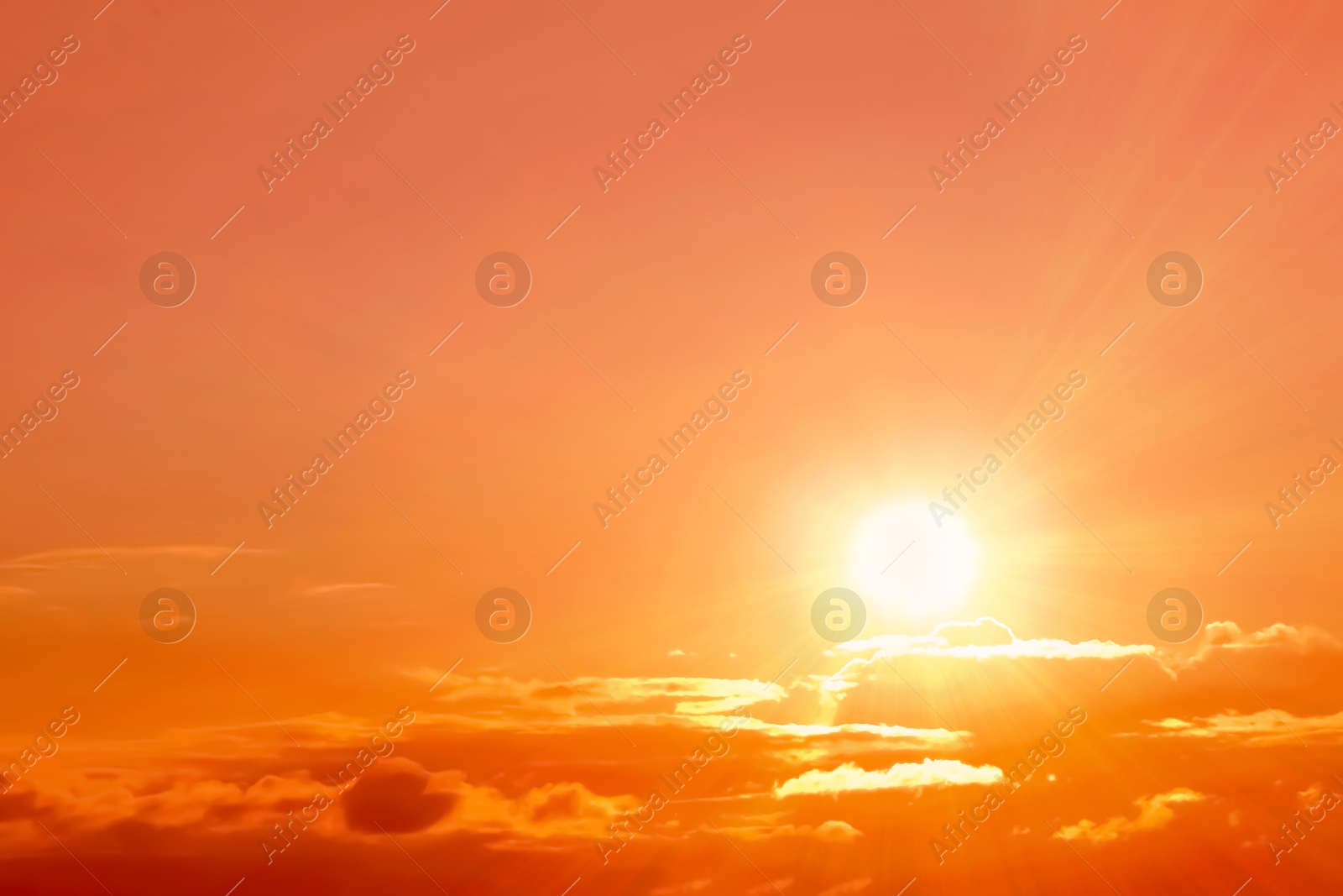 Orange sky with clouds during hot summer weather Image of Orange sky with clouds during hot summer weather