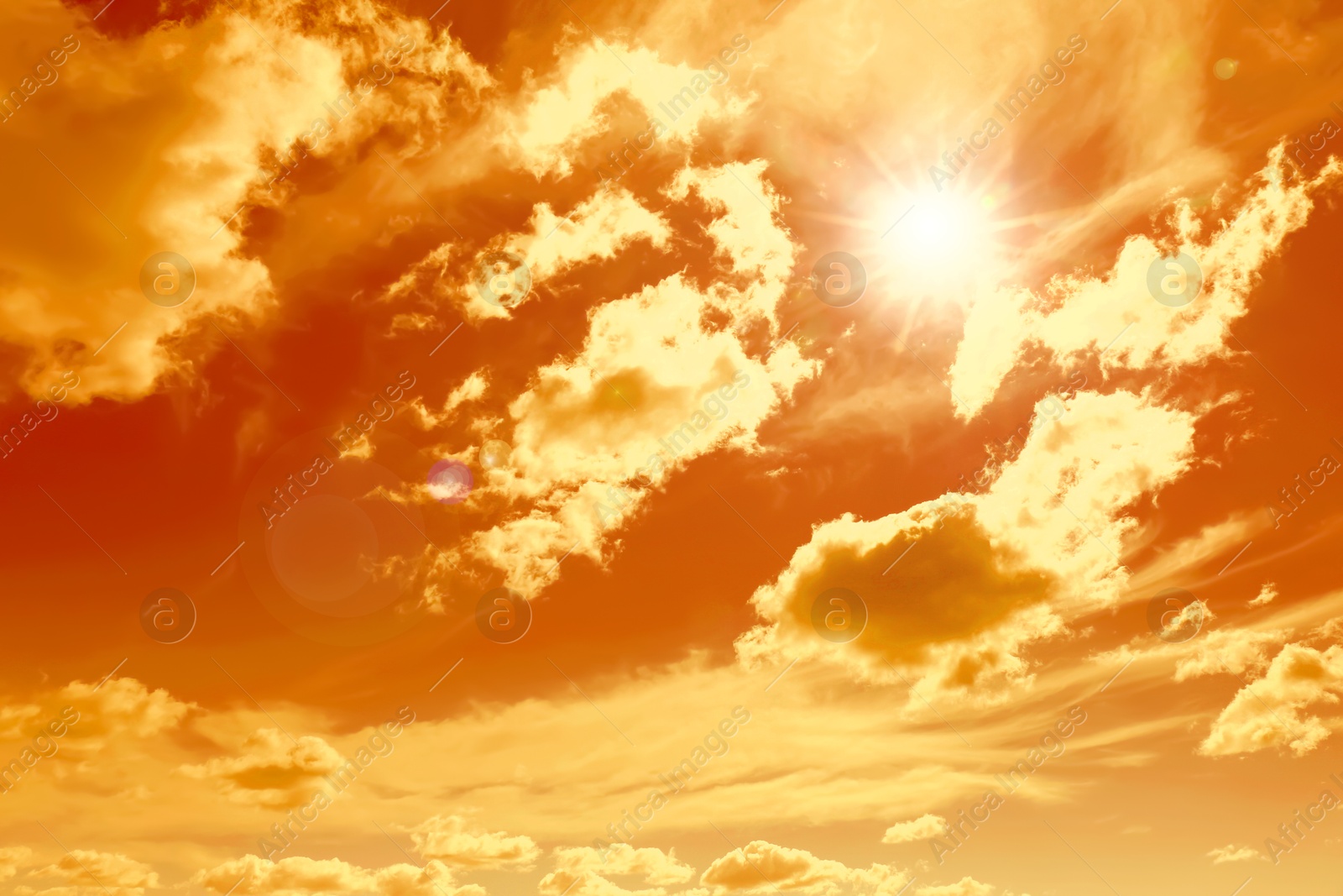 Orange sky with clouds during hot summer weather Image of Orange sky with clouds during hot summer weather