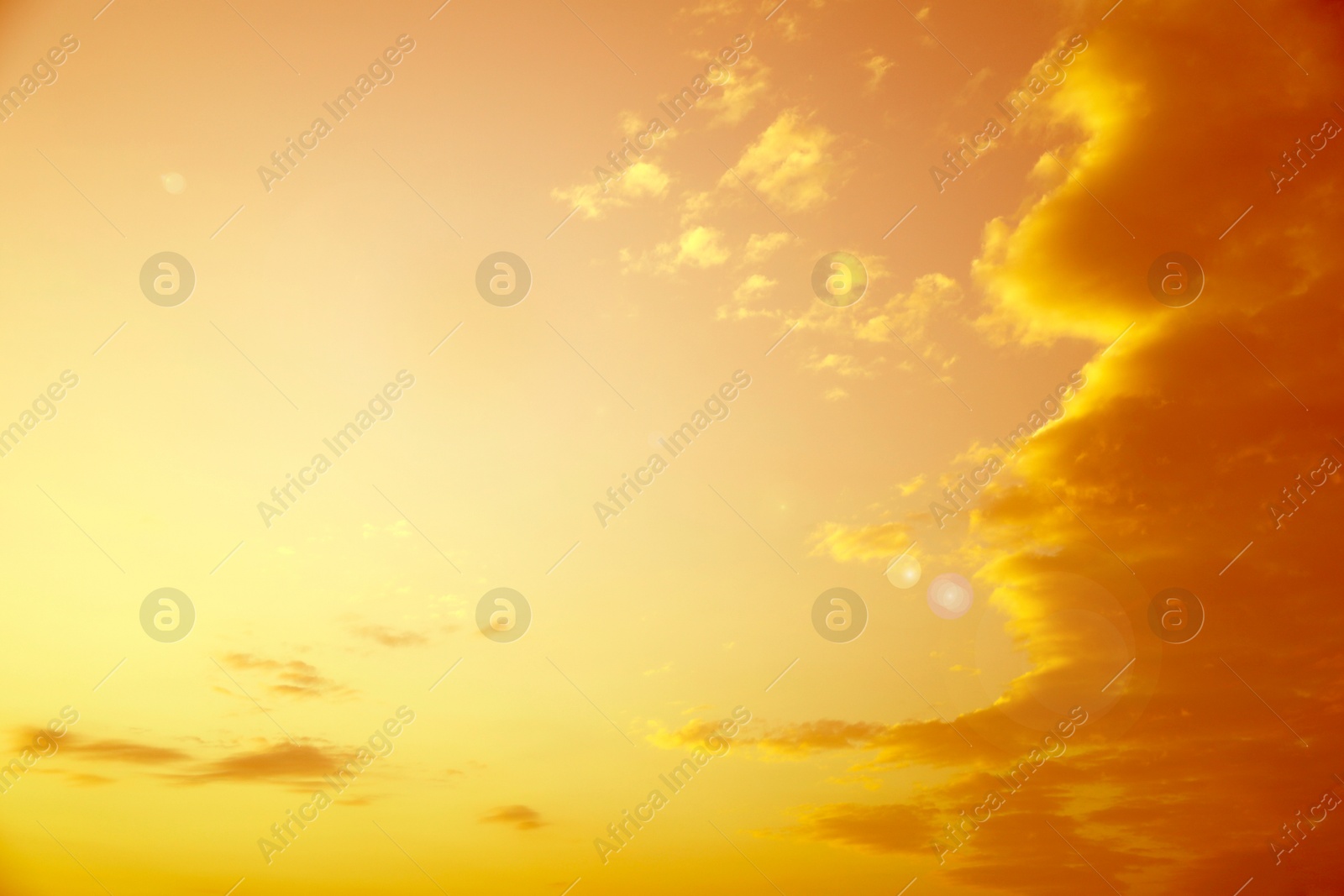 Orange sky with clouds during hot summer weather Image of Orange sky with clouds during hot summer weather
