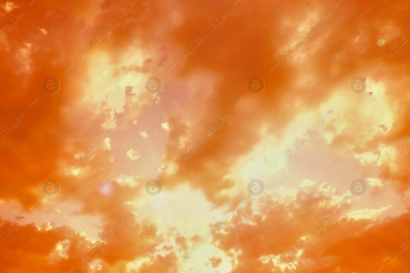 Orange sky with clouds during hot summer weather Image of Orange sky with clouds during hot summer weather