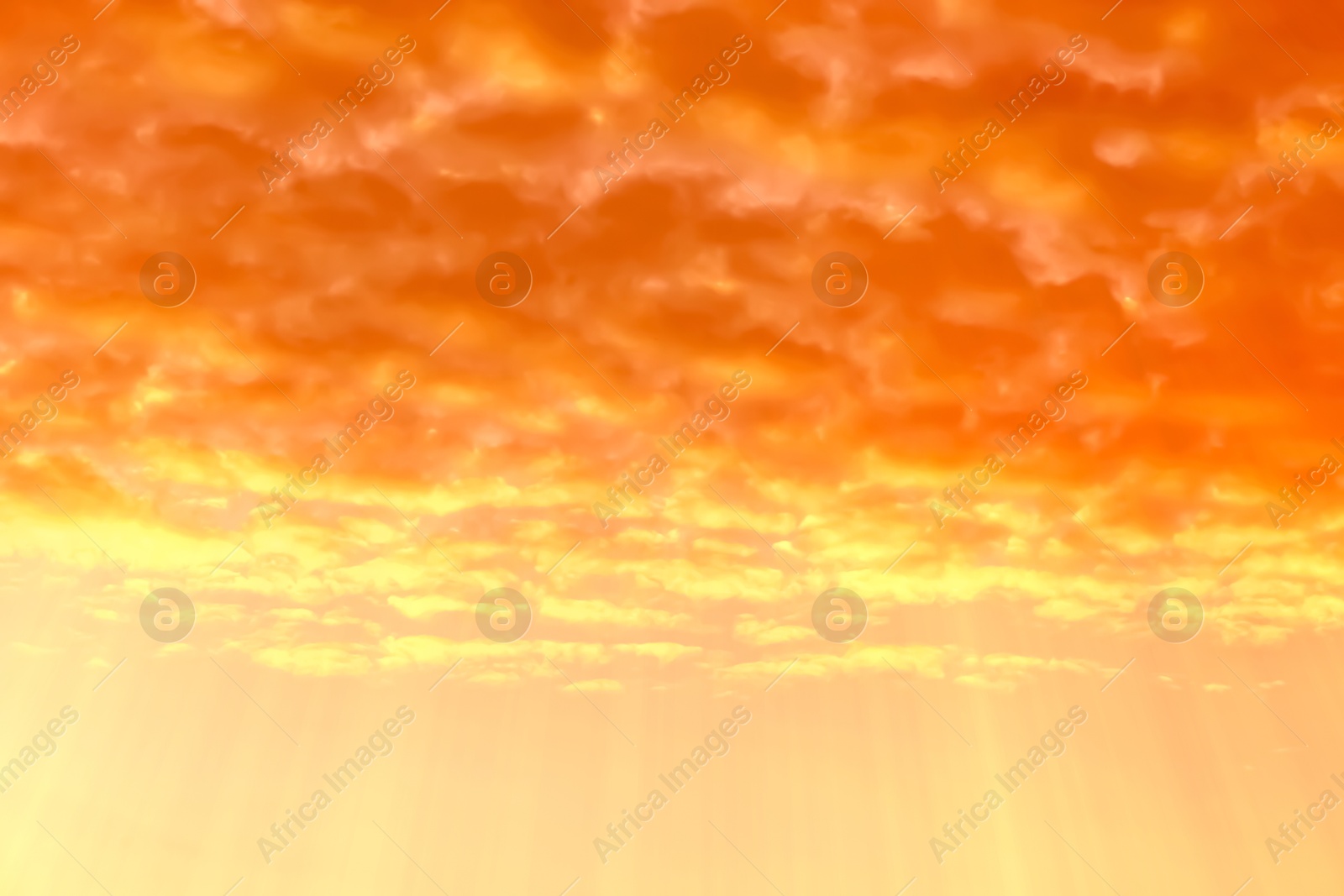 Orange sky with clouds during hot summer weather Image of Orange sky with clouds during hot summer weather
