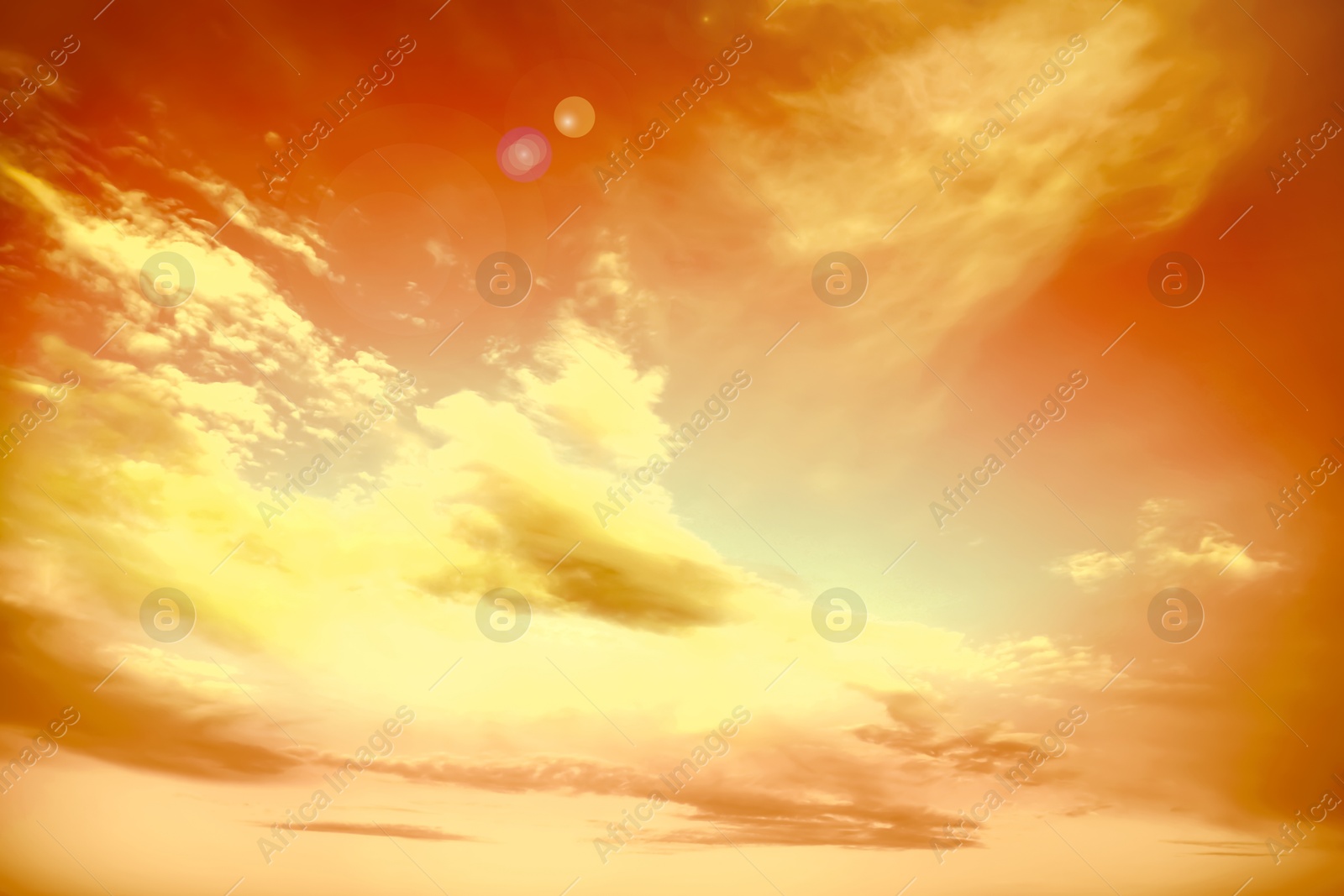 Orange sky with clouds during hot summer weather Image of Orange sky with clouds during hot summer weather