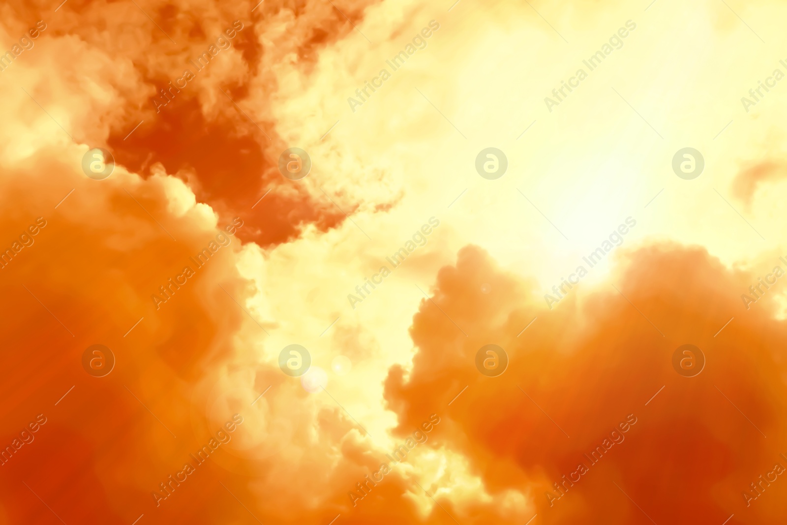 Orange sky with clouds during hot summer weather Image of Orange sky with clouds during hot summer weather