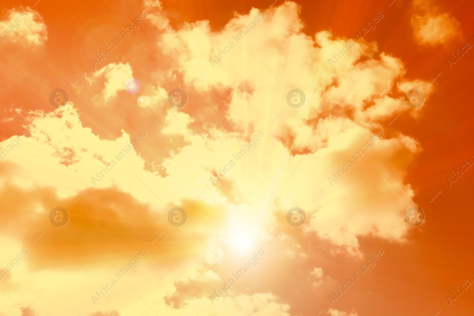 Orange sky with clouds during hot summer weather Image of Orange sky with clouds during hot summer weather