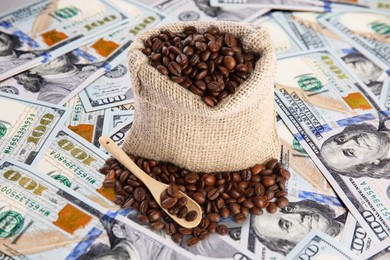 Image of Coffee price rising. Dollars and roasted coffee beans