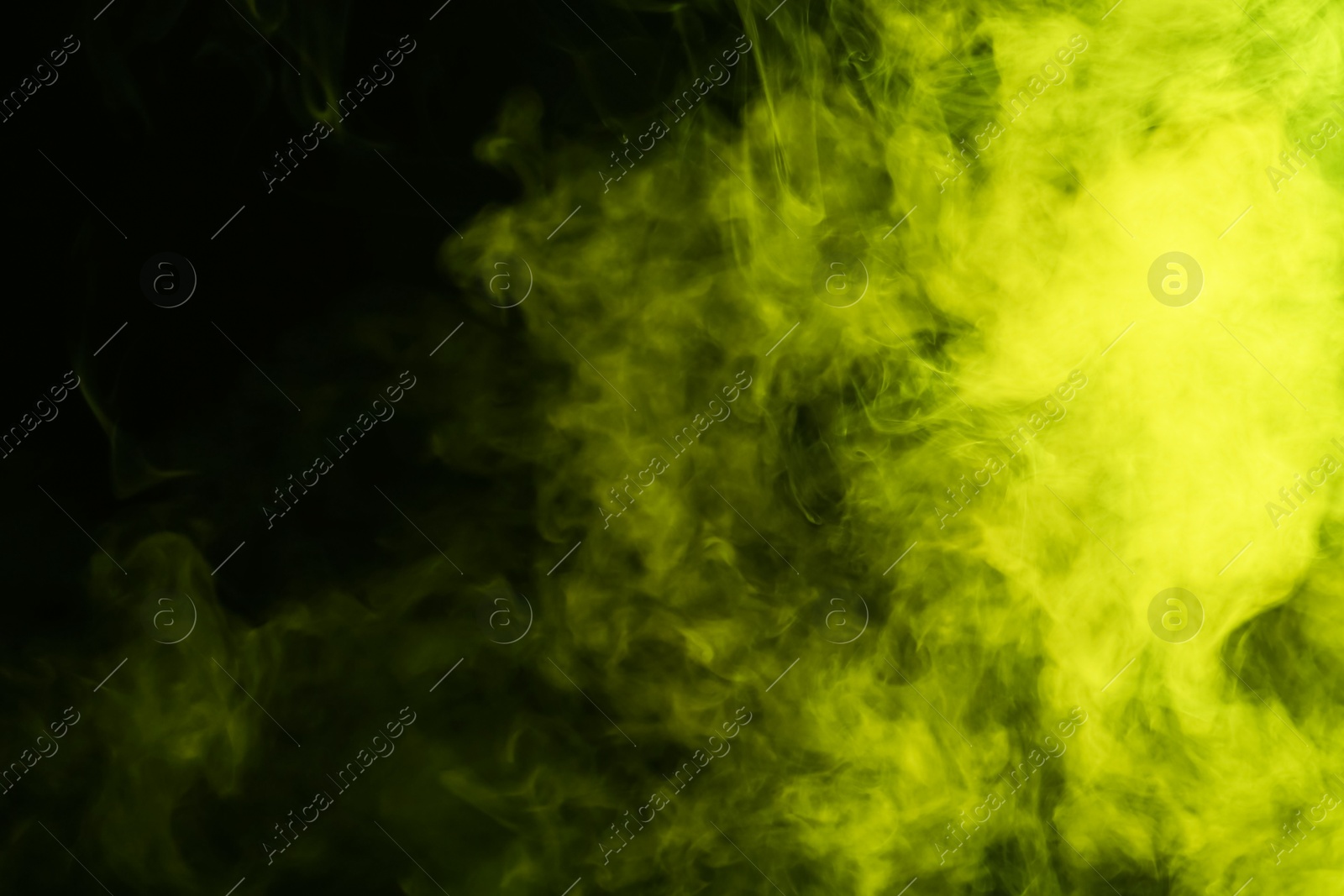 Photo of Hookah smoke in yellow light on black background, closeup